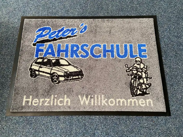 Logomatte für Fahrschulen – Eingangsmatte mit individuellem Fahrschul-Motiv